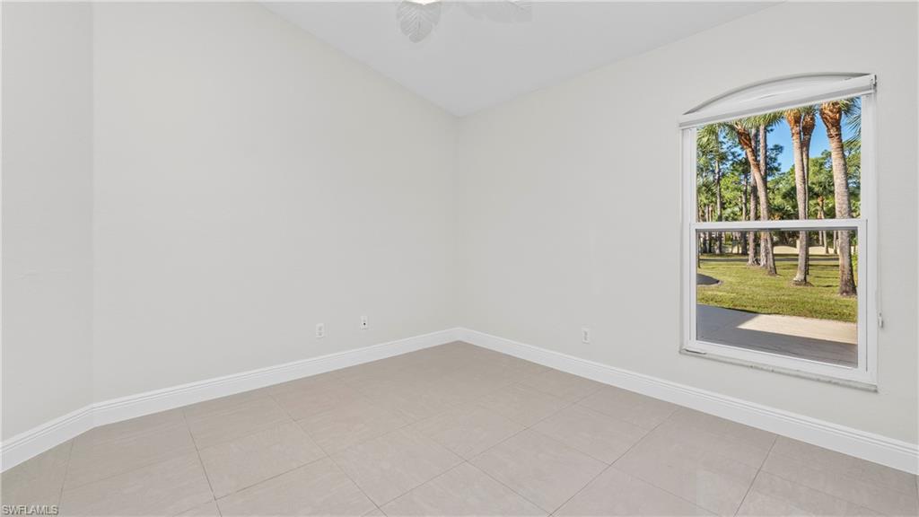 1580 16th Street Northeast Naples, FL 34120 - Photo 30 of 50 a view of an empty room with a window