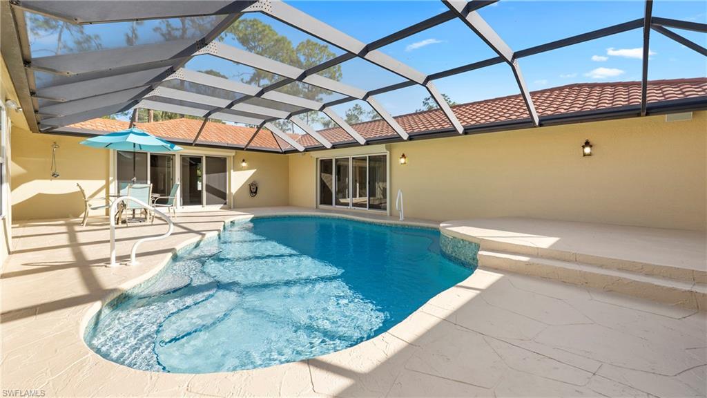1580 16th Street Northeast Naples, FL 34120 - Photo 33 of 50 a view of swimming pool with a patio