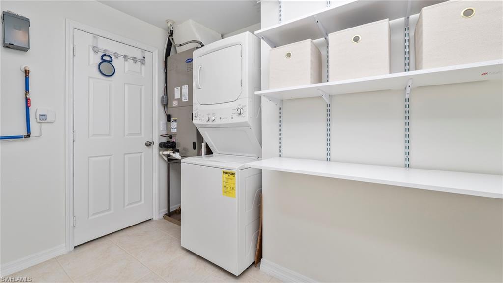1580 16th Street Northeast Naples, FL 34120 - Photo 46 of 50 a utility room with dryer and washer