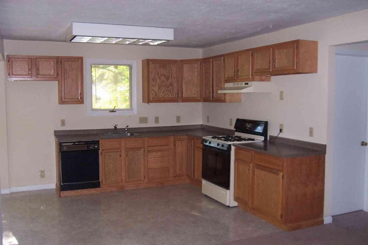 1706 Valley Road Effort, PA 18330 - Photo 5 of 15 a kitchen with stainless steel appliances granite countertop a stove a sink and a granite counter tops