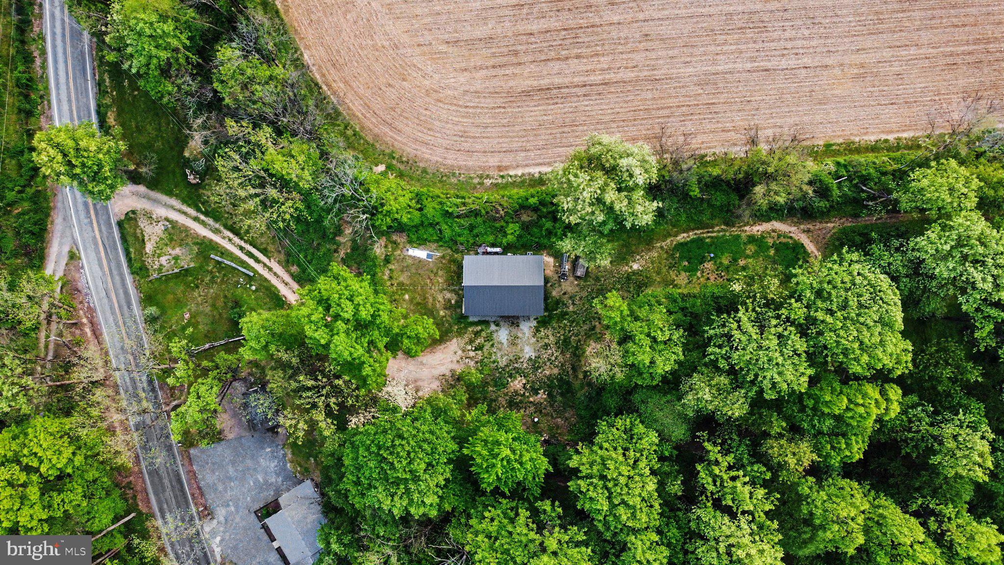 152 River Road Pequea, PA 17565 - Photo 7 of 8 a backyard of a house with lots of green space