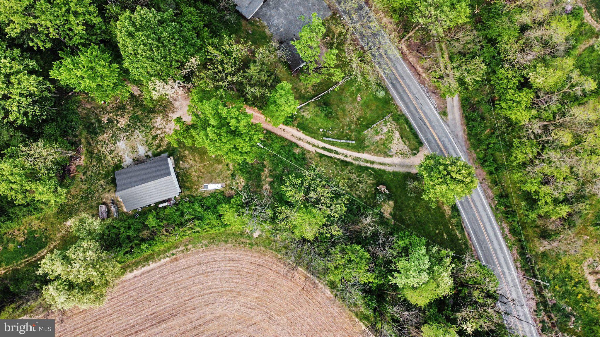 152 River Road Pequea, PA 17565 - Photo 8 of 8 an aerial view of a house with a yard