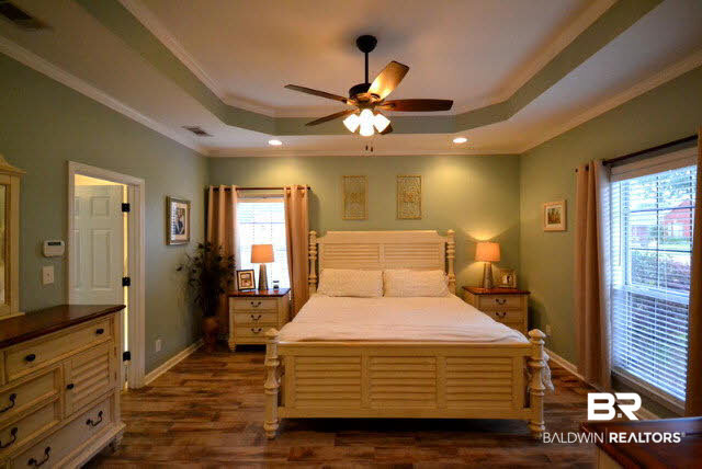 1640 Augusta Drive West Mobile, AL 36695 - Photo 11 of 25 Master bedroom is gorgeous with trey ceiling, new porcelain tile flooring and lots of natural light.