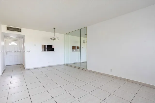 a view of a kitchen with a sink