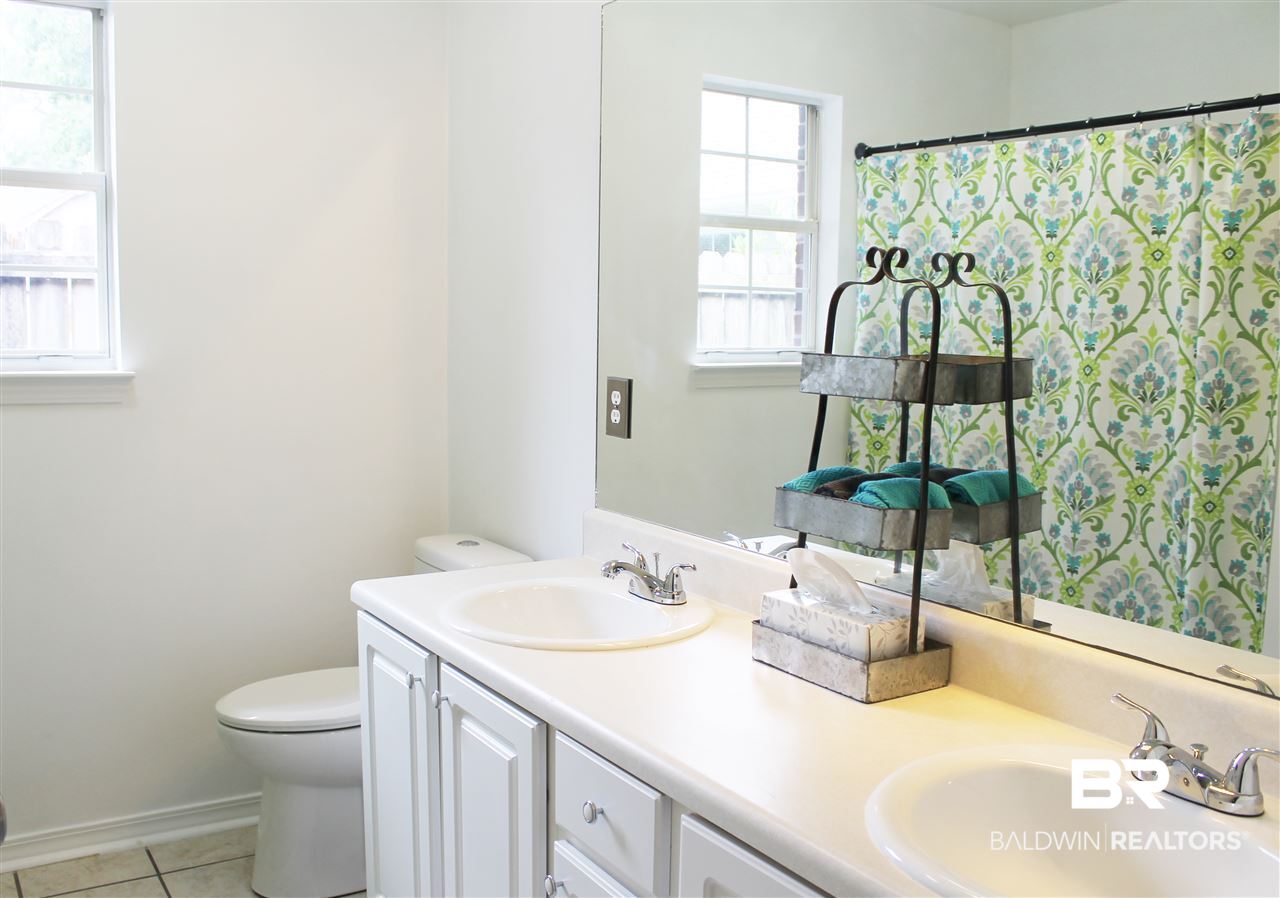 8522 Southern Oak Court Mobile, AL 36695 - Photo 14 of 21 Double sinks, large vanity and a tub/shower combo