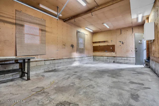 a view of a hallway with seating area