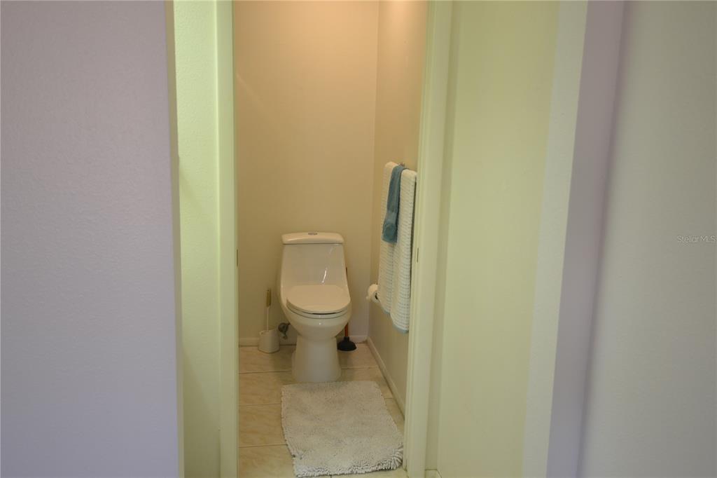 7331 Greystone Drive Hudson, FL 34667 - Photo 13 of 39 a white toilet sitting next to a white wall