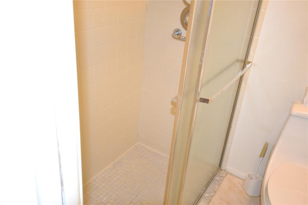 7331 Greystone Drive Hudson, FL 34667 - Photo 17 of 39 a bathroom with a sink and a mirror