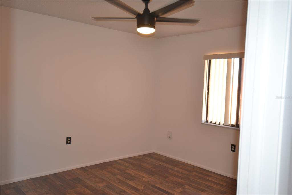 7331 Greystone Drive Hudson, FL 34667 - Photo 22 of 39 an empty room with a window