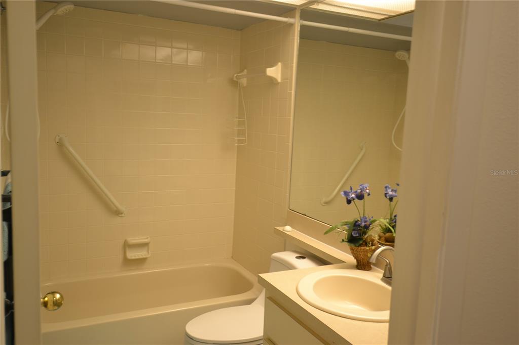 7331 Greystone Drive Hudson, FL 34667 - Photo 29 of 39 a bathroom with a sink and a mirror
