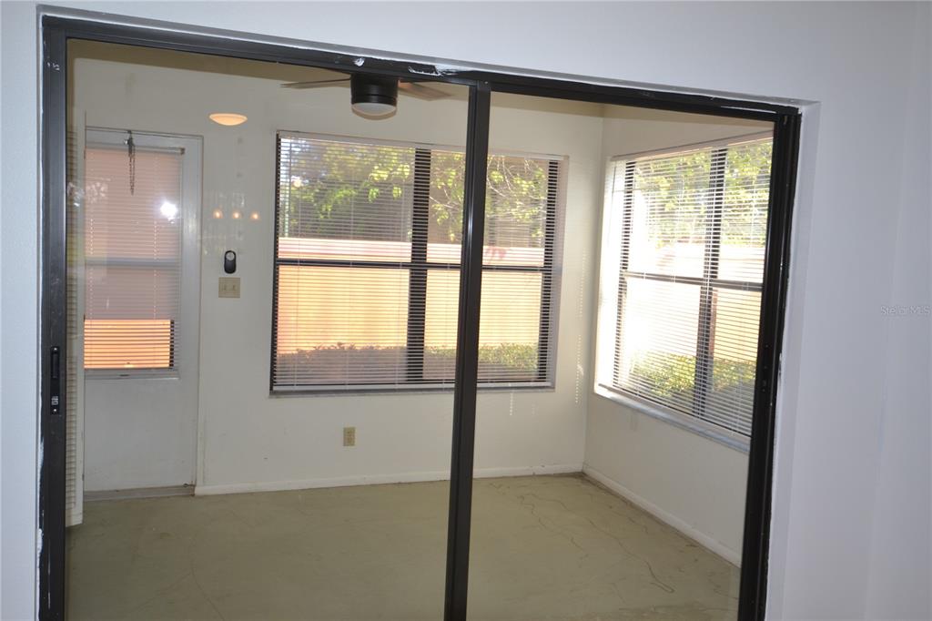 7331 Greystone Drive Hudson, FL 34667 - Photo 33 of 39 a view of an empty room with a window