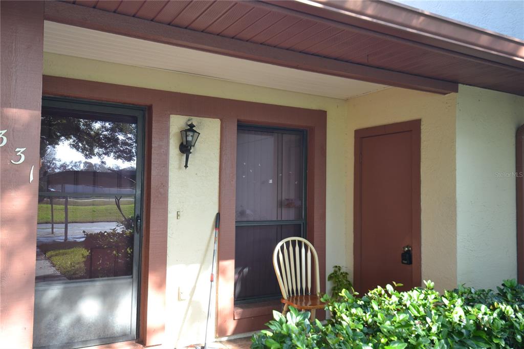 7331 Greystone Drive Hudson, FL 34667 - Photo 39 of 39 a view of balcony with a potted plant
