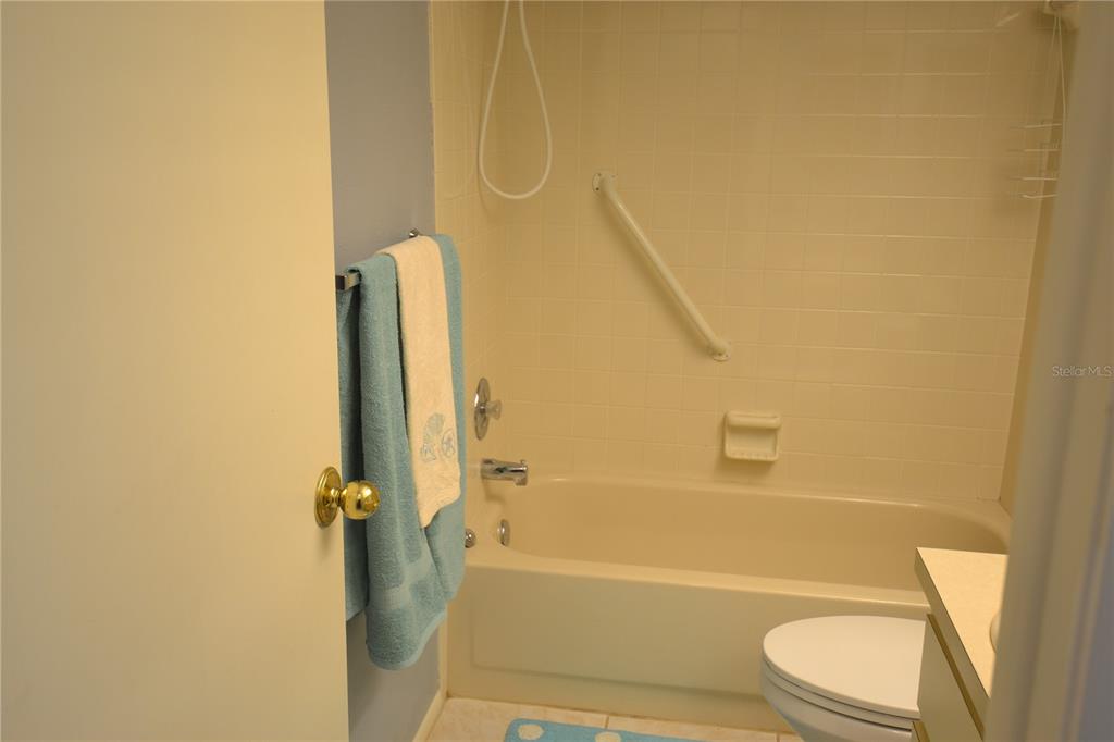 7331 Greystone Drive Hudson, FL 34667 - Photo 8 of 39 a bathroom with a toilet and a bath tub