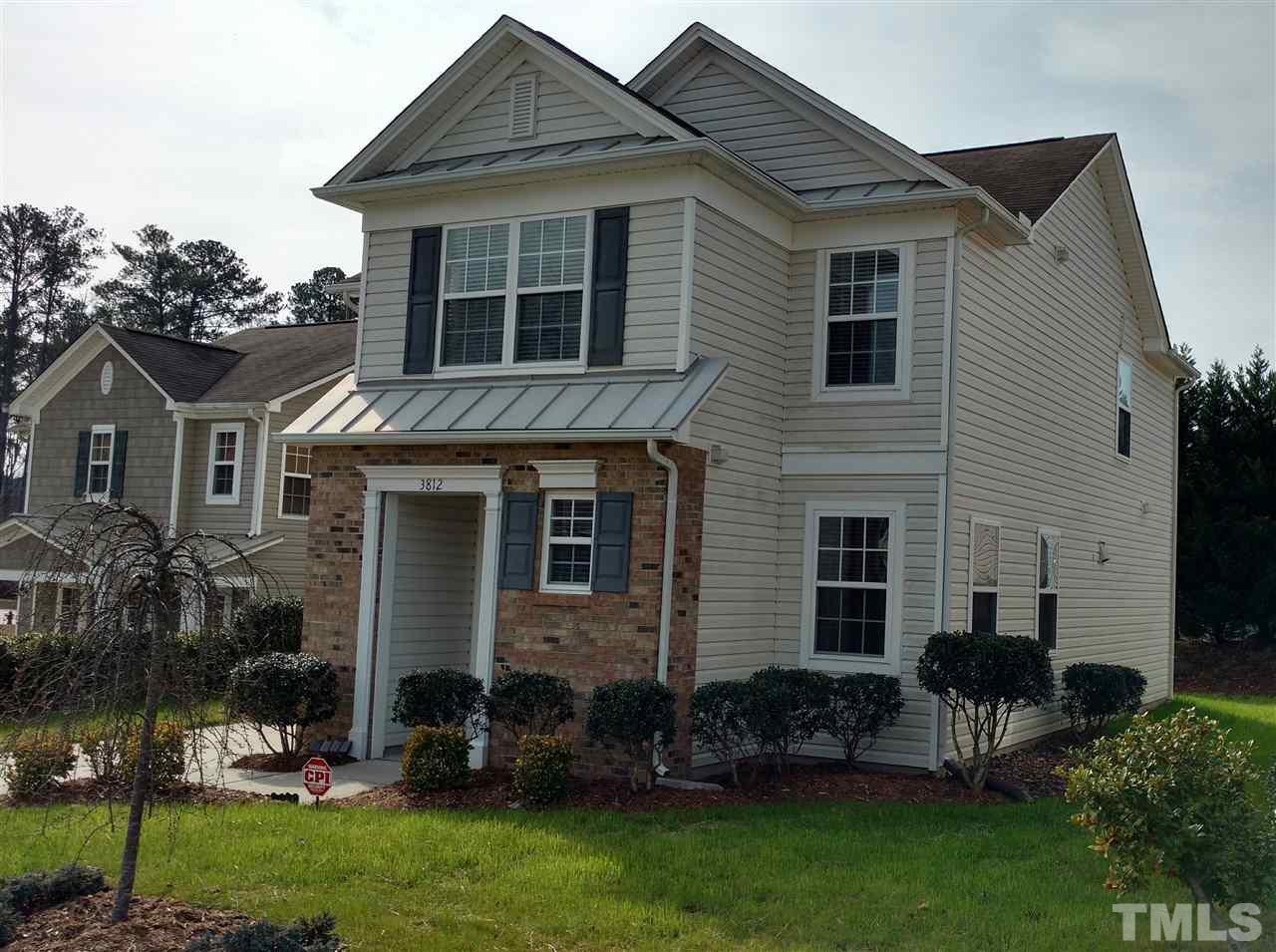 3812 Tryon Ridge Drive Raleigh, NC 27610 - Photo 21 of 23 a view of a house with a yard and plants