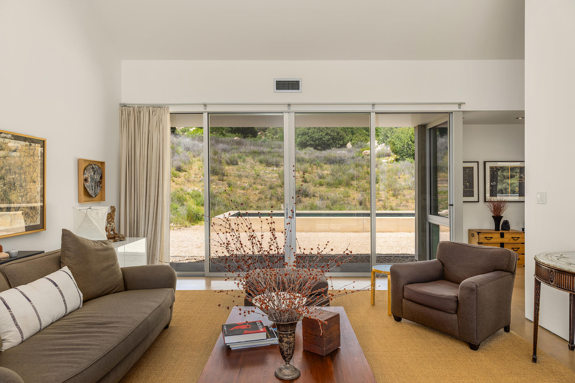 12179 Koenigstein Road Santa Paula, CA 93060 - Photo 19 of 43 a living room with furniture and a large window