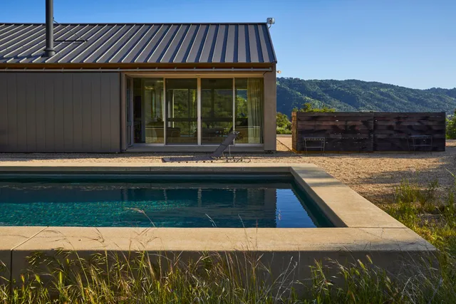 a view of a swimming pool with an outdoor space