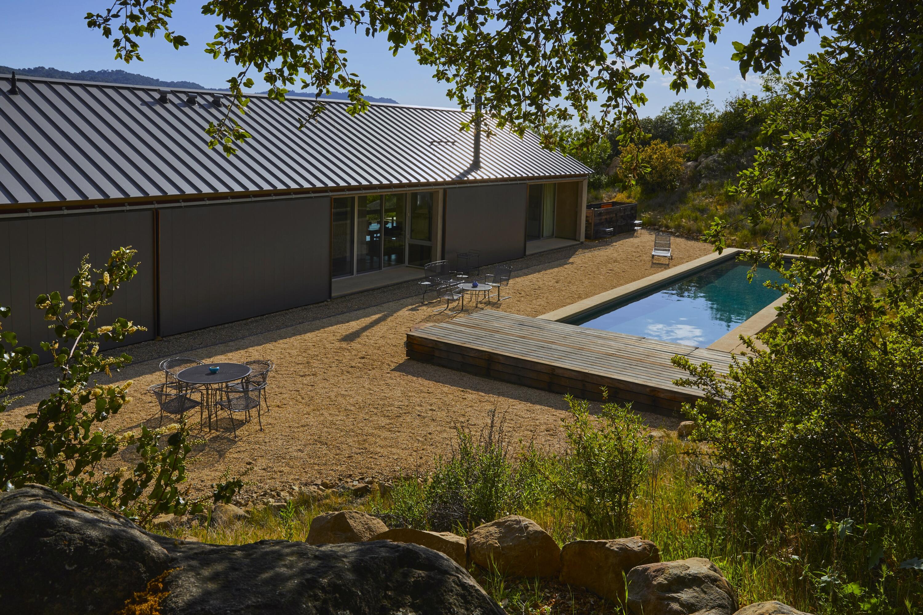 12179 Koenigstein Road Santa Paula, CA 93060 - Photo 7 of 43 a view of a house with backyard and sitting area