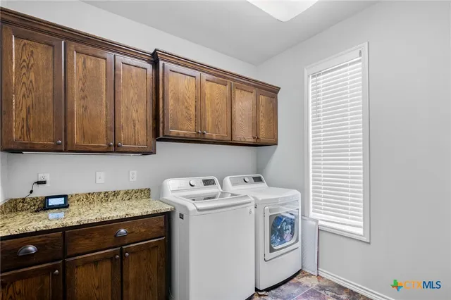 a view of a backyard with swimming pool