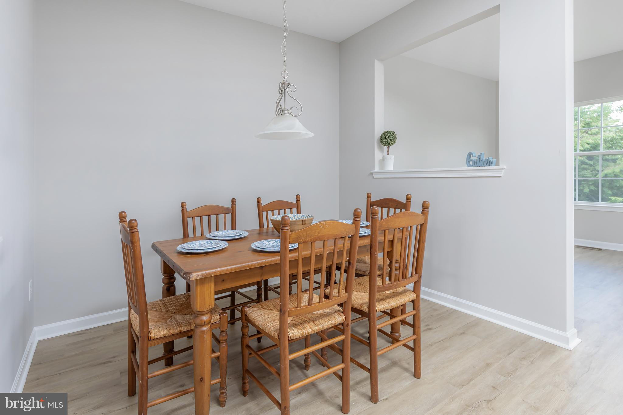 371 Concetta Drive Mount Royal, NJ 08061 - Photo 13 of 20 a view of a dining room with furniture and wooden floor