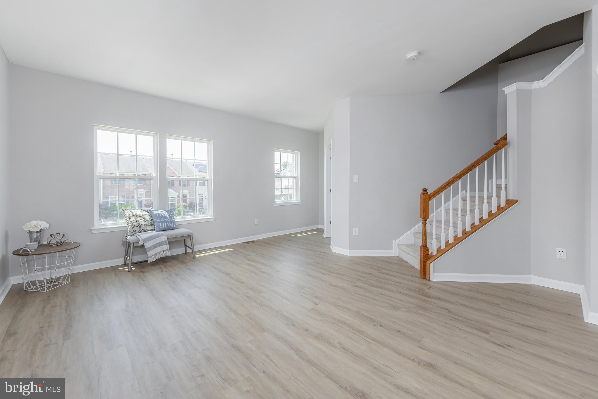 371 Concetta Drive Mount Royal, NJ 08061 - Photo 7 of 20 a view of an empty room with wooden floor and a window