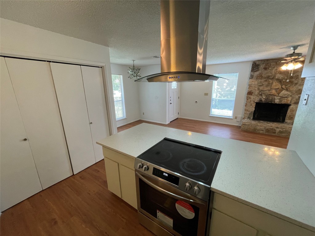 7506 St Amant Place, Unit B Austin, TX 78749 - Photo 16 of 16 a view of kitchen appliances and wooden floor