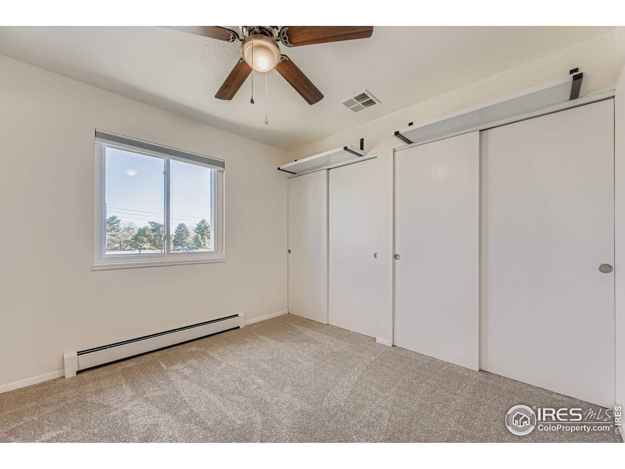 3565 28th Street, Unit 201 Boulder, CO 80301 - Photo 7 of 13 a view of an empty room with a window