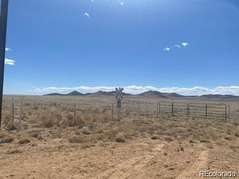 18772 County Road South Blanca, CO 81123 - Photo 16 of 21 a view of a large mountain with a mountain in the background