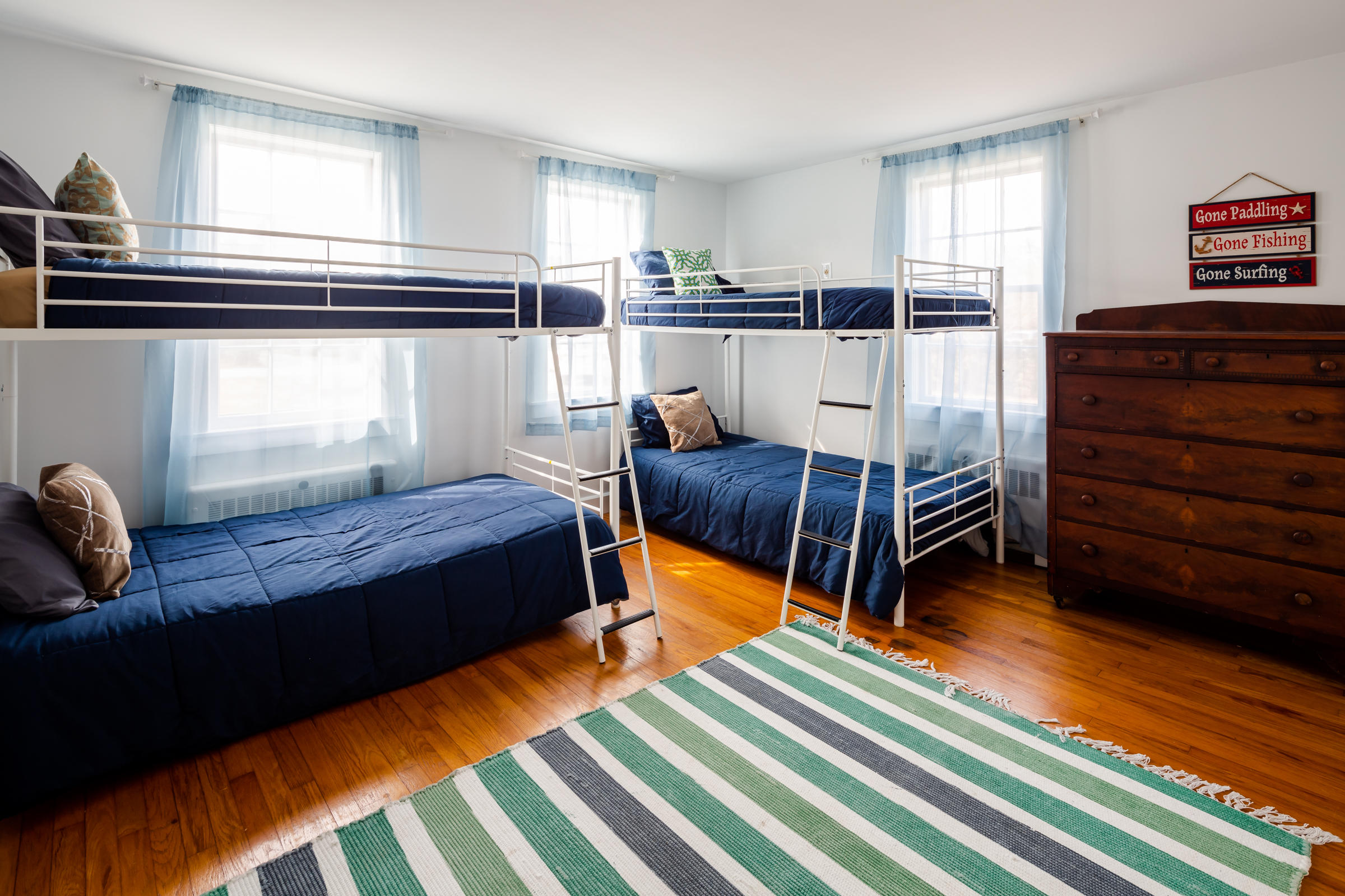 700 Main Street Cotuit, MA 02635 - Photo 11 of 20 a bedroom with a bed and furniture