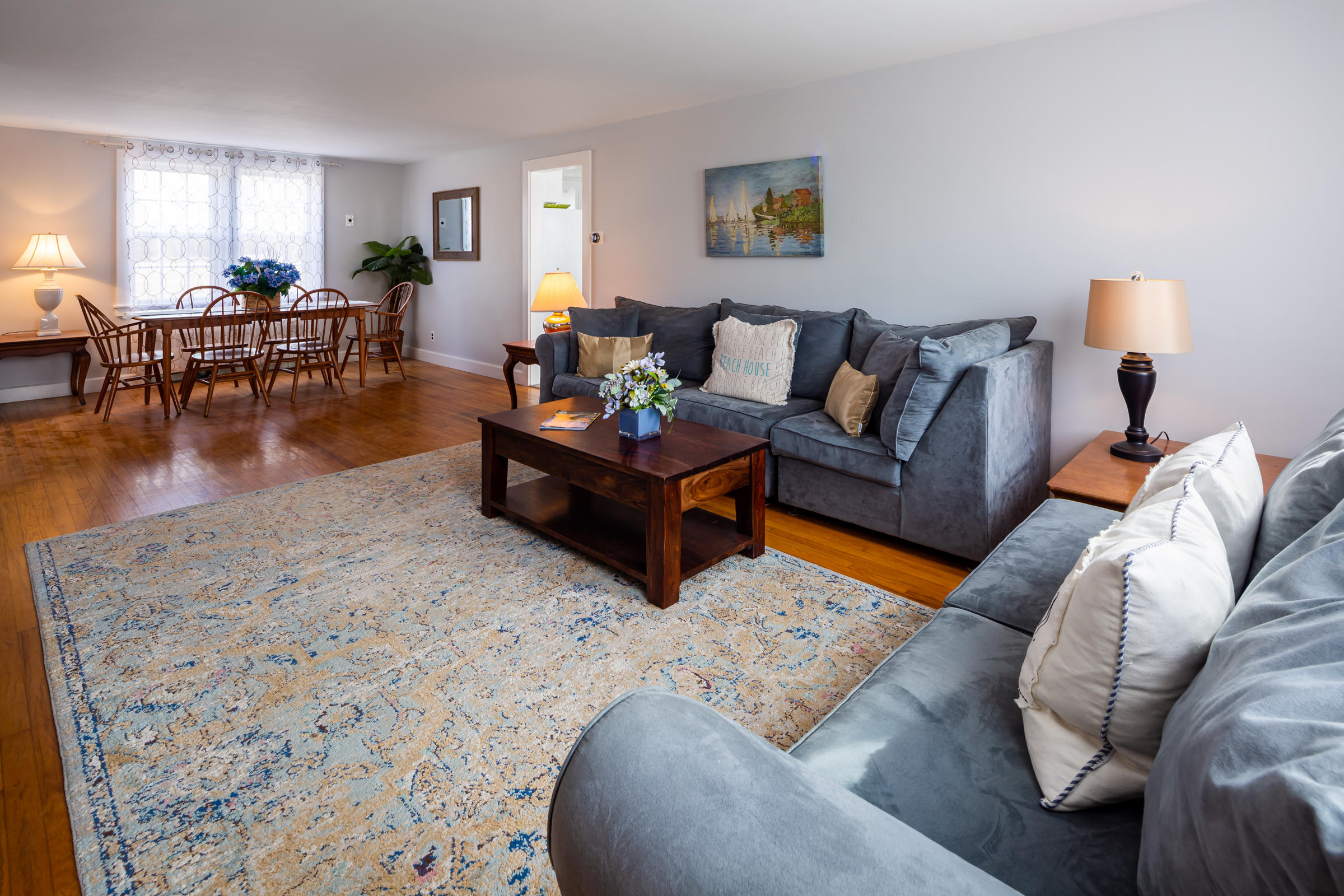 700 Main Street Cotuit, MA 02635 - Photo 3 of 20 a living room with furniture and wooden floor