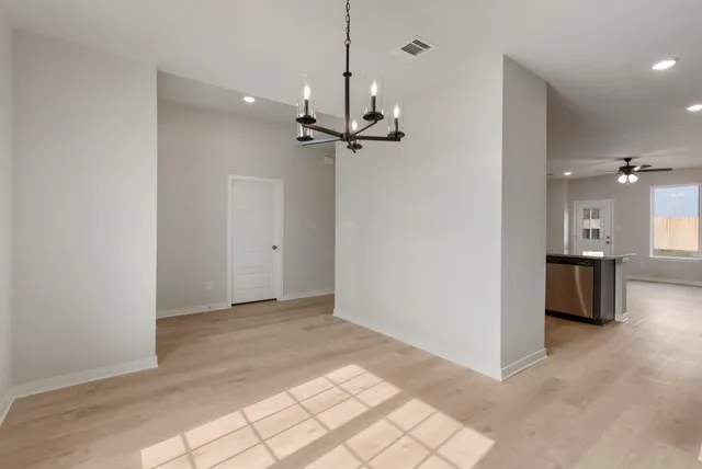 a view of a kitchen with a sink