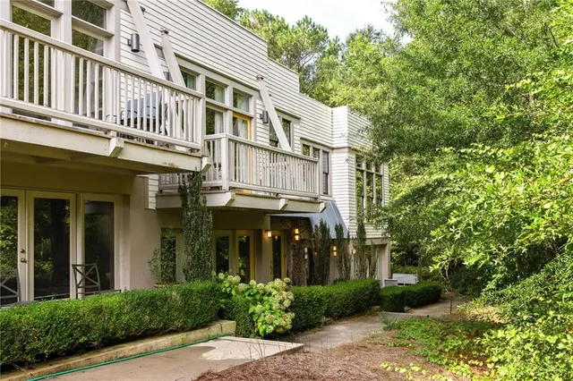 a view of a building with a yard
