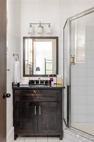 a kitchen with a stove a sink and a refrigerator