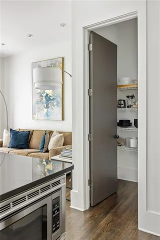 a kitchen with a stove and a refrigerator