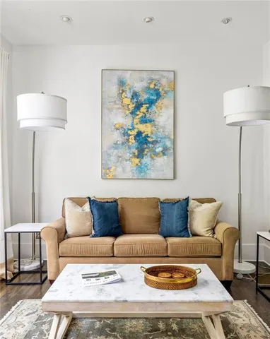 a living room with furniture and a couch