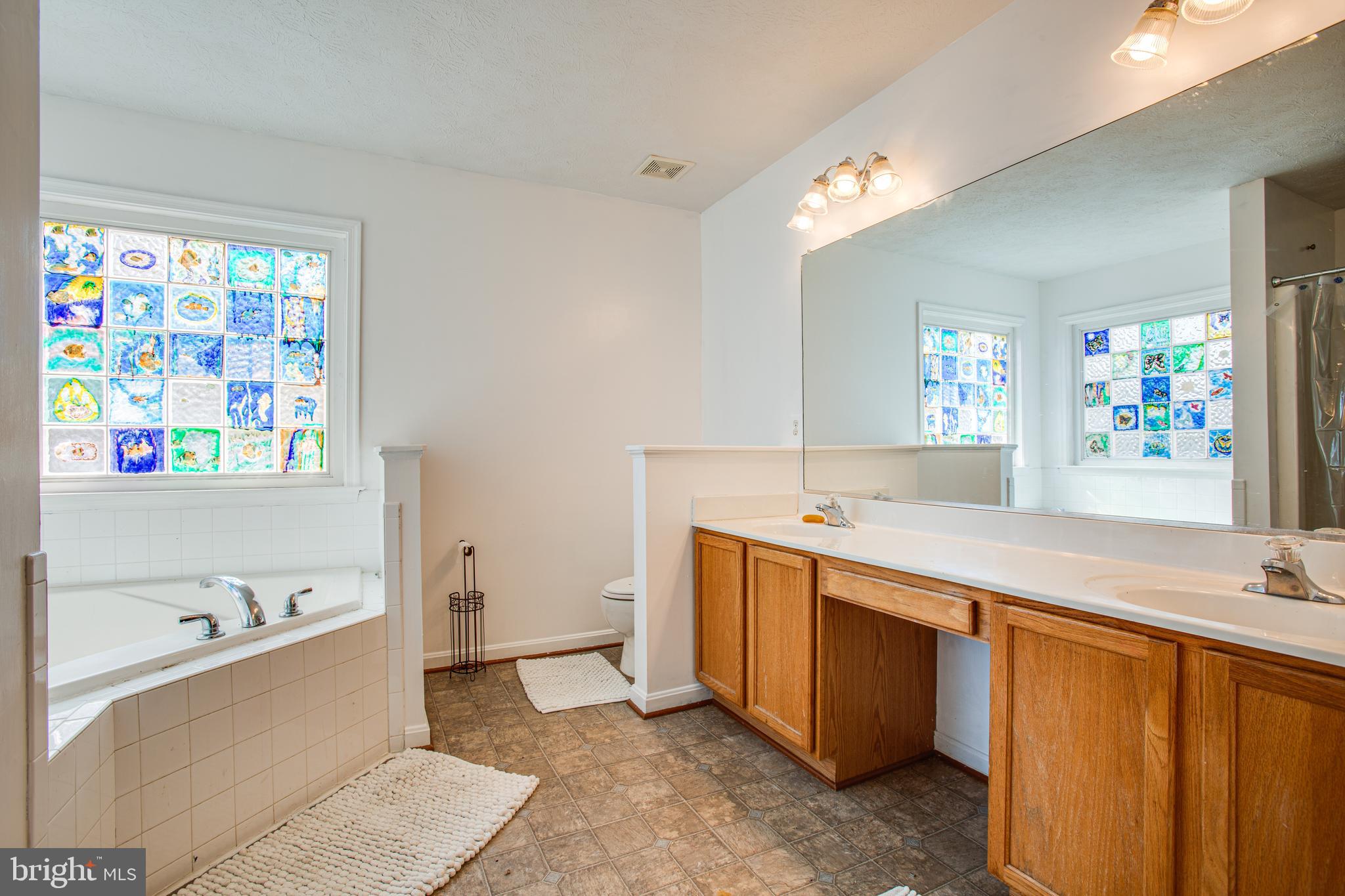 35258 Pheasant Ridge Road Locust Grove, VA 22508 - Photo 21 of 51 Luxury master bath with tub and separate shower