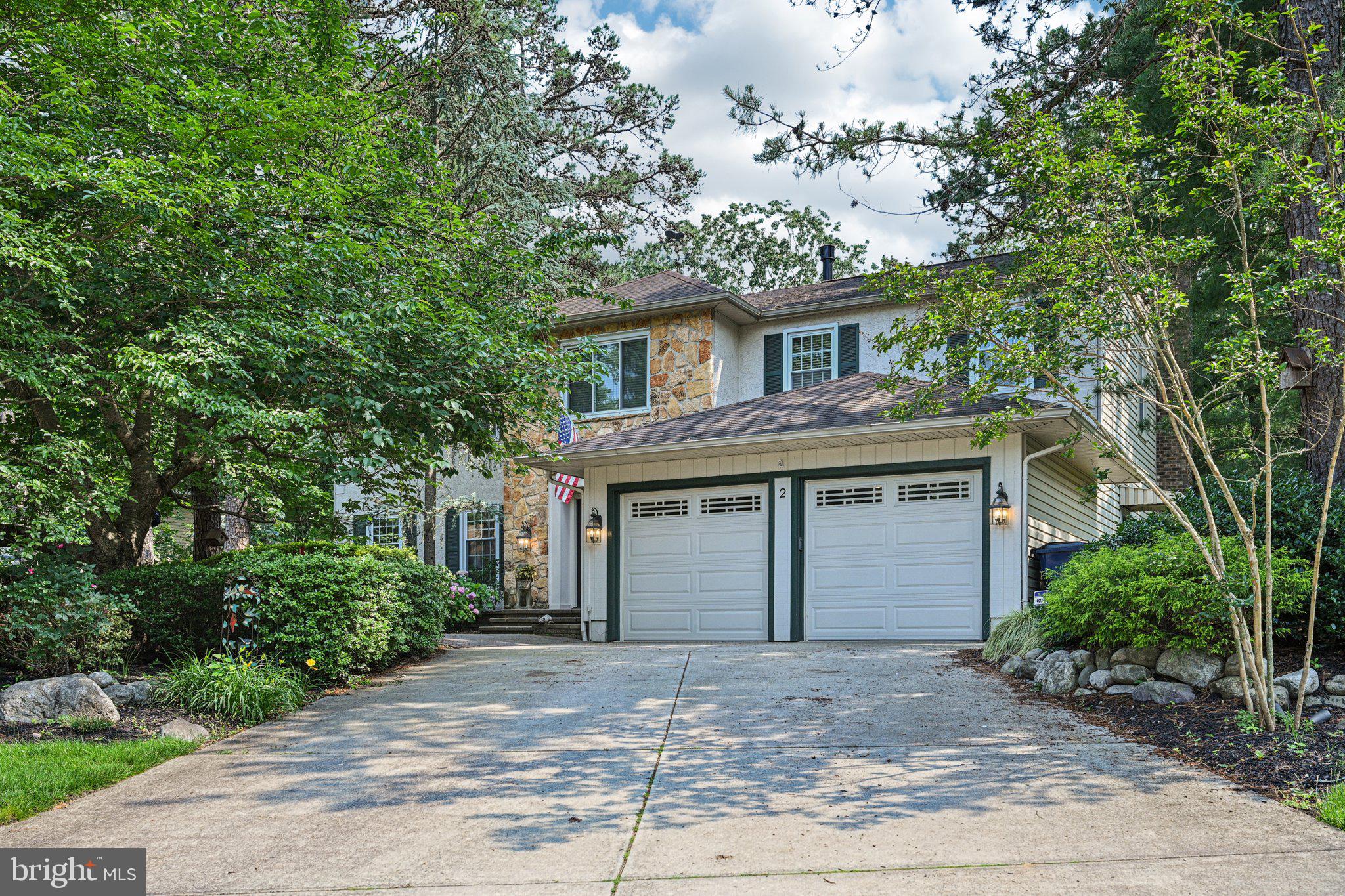 2 Keston Place Voorhees, NJ 08043 - Photo 1 of 83 a front view of a house with a garden