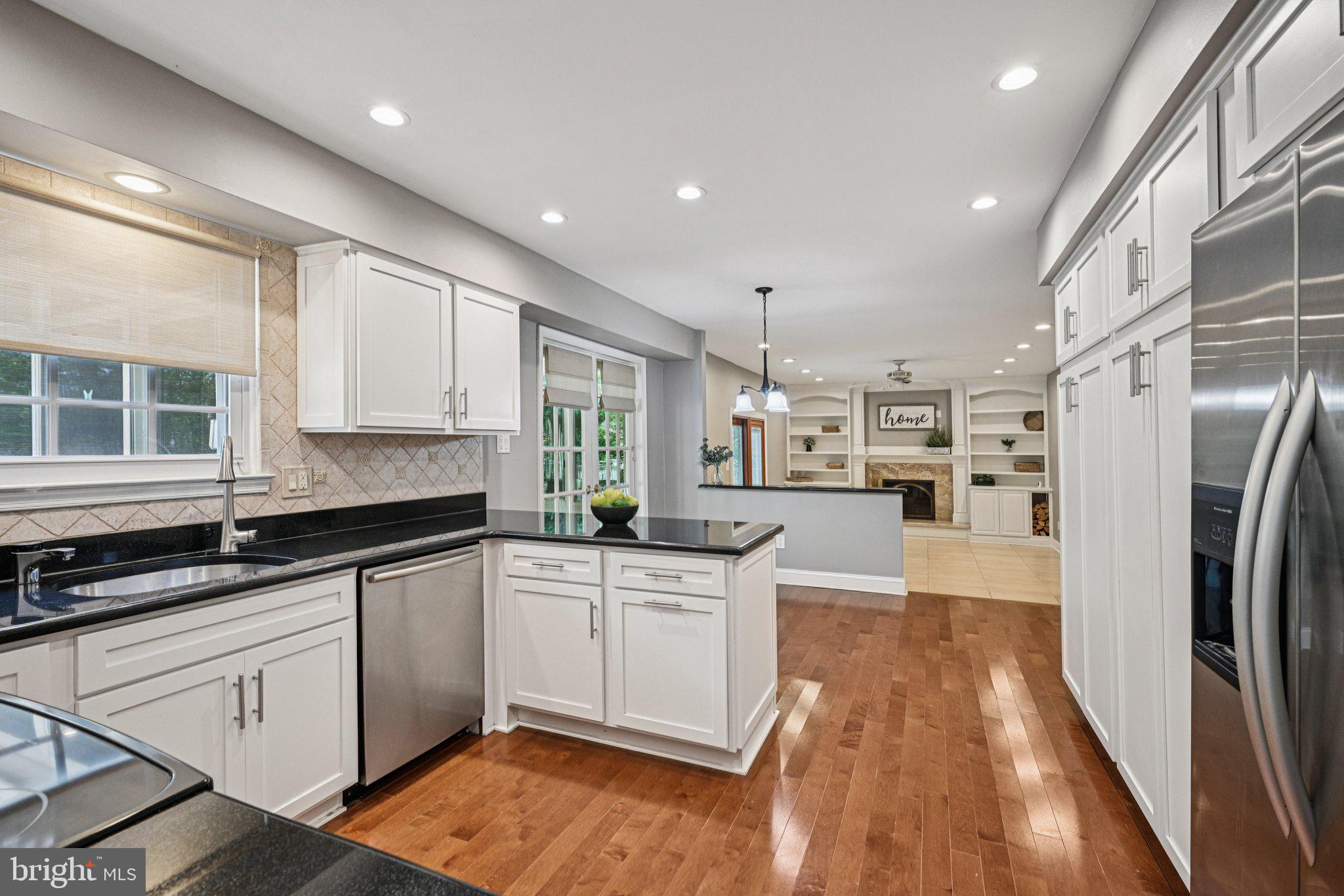 2 Keston Place Voorhees, NJ 08043 - Photo 13 of 83 a kitchen with stainless steel appliances granite countertop a refrigerator and a stove top oven