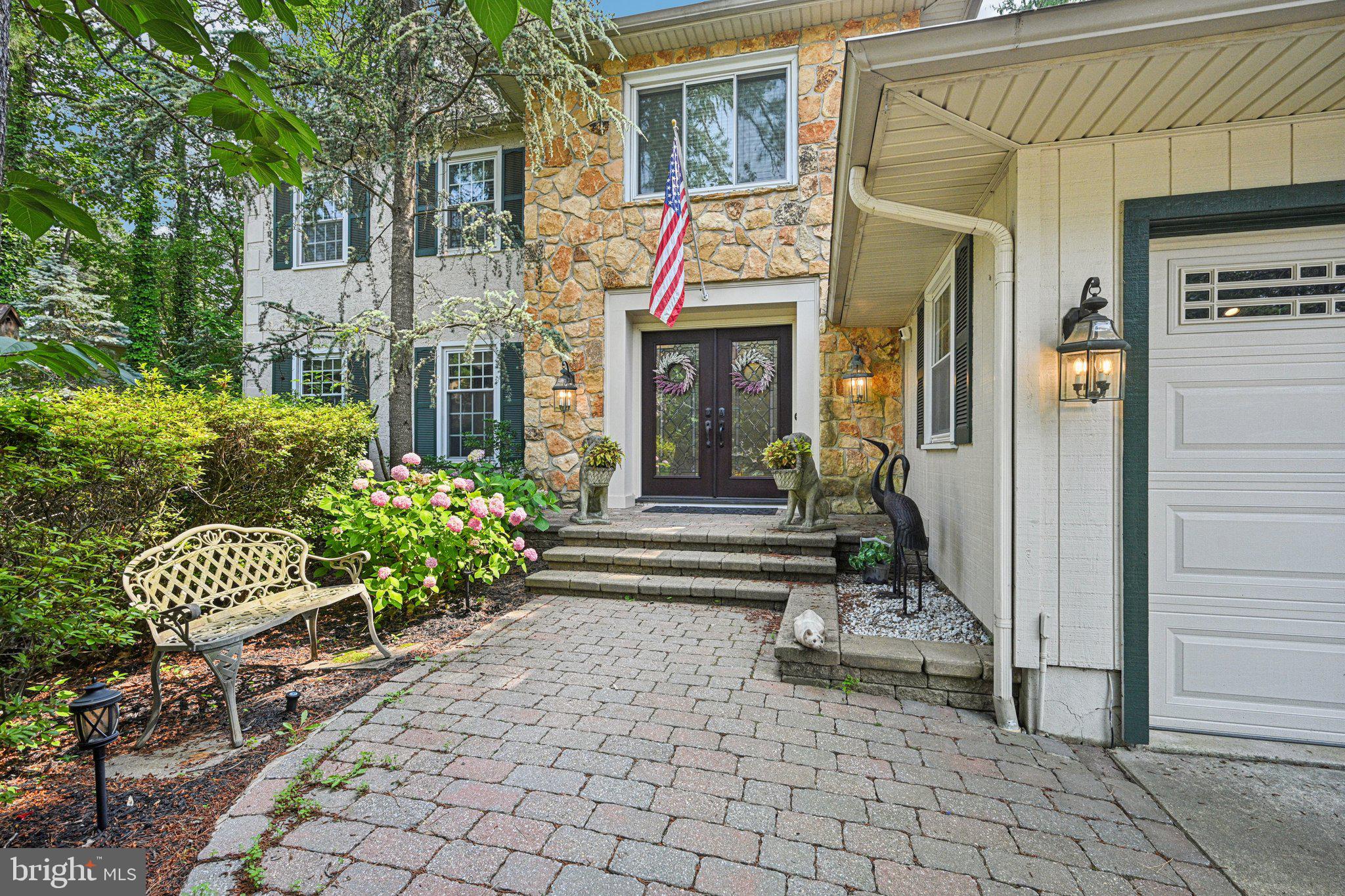 2 Keston Place Voorhees, NJ 08043 - Photo 2 of 83 a front view of a house with a garden