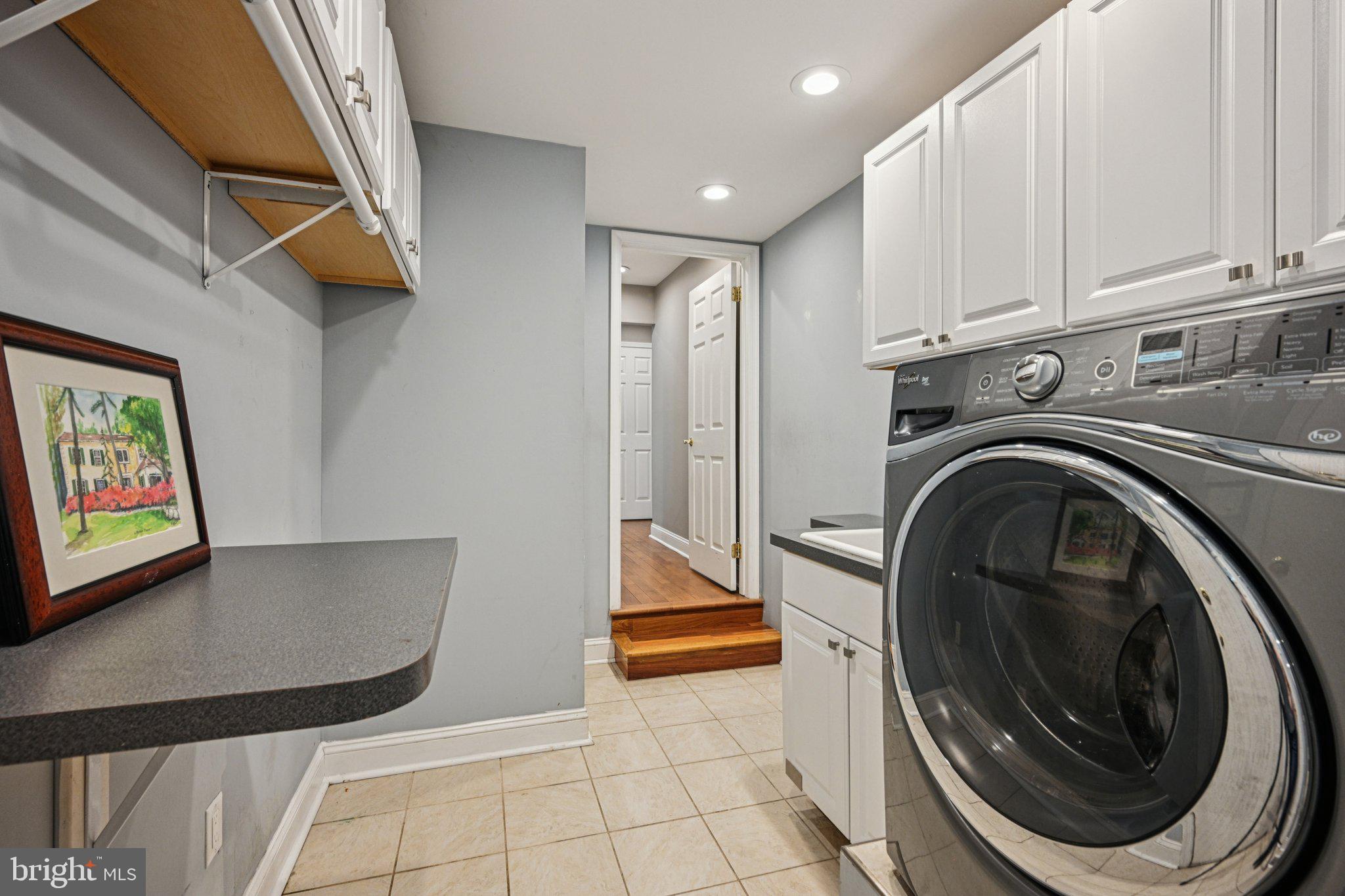 2 Keston Place Voorhees, NJ 08043 - Photo 21 of 83 a view of a hallway with washer and dryer