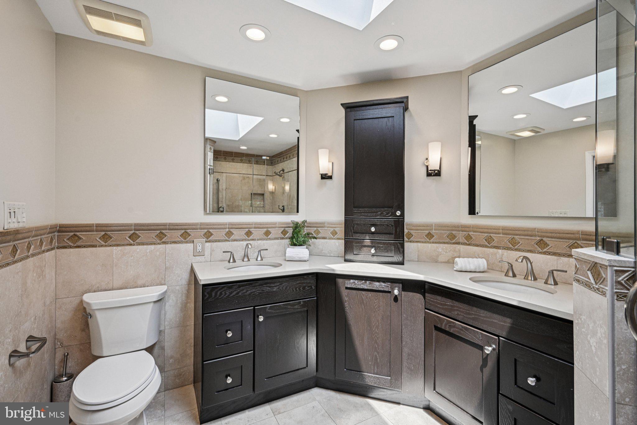 2 Keston Place Voorhees, NJ 08043 - Photo 29 of 83 a bathroom with a sink vanity toilet and a mirror