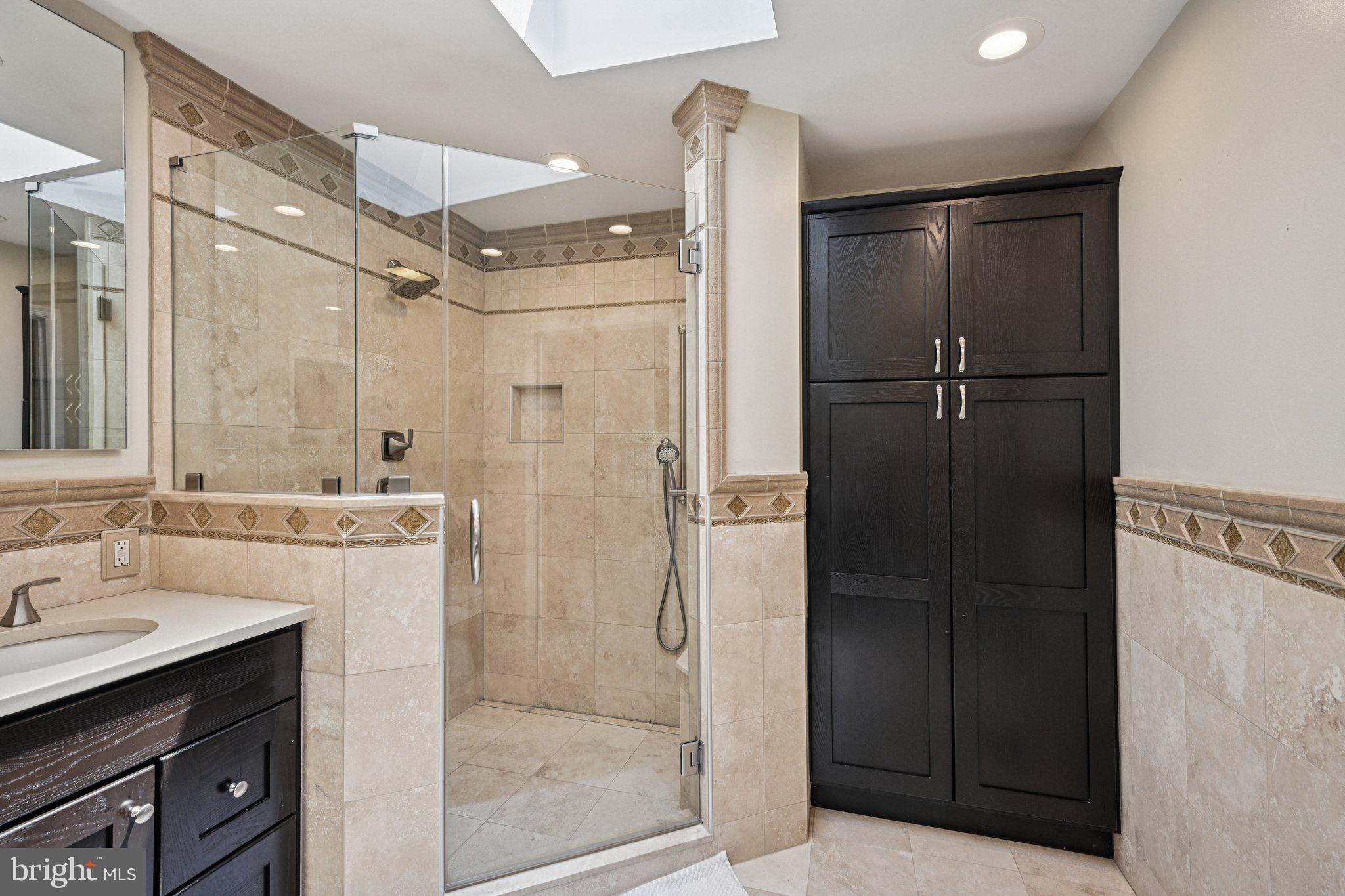 2 Keston Place Voorhees, NJ 08043 - Photo 30 of 83 a bathroom with a shower sink vanity and mirror