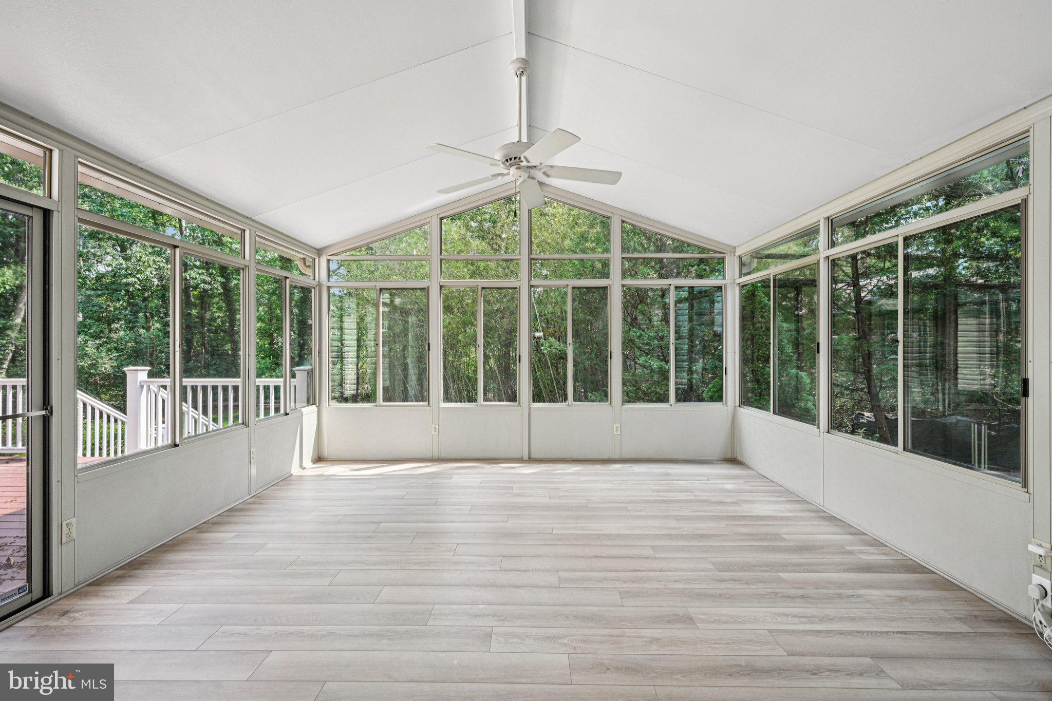 2 Keston Place Voorhees, NJ 08043 - Photo 42 of 83 a view of an empty room with wooden floor and a window