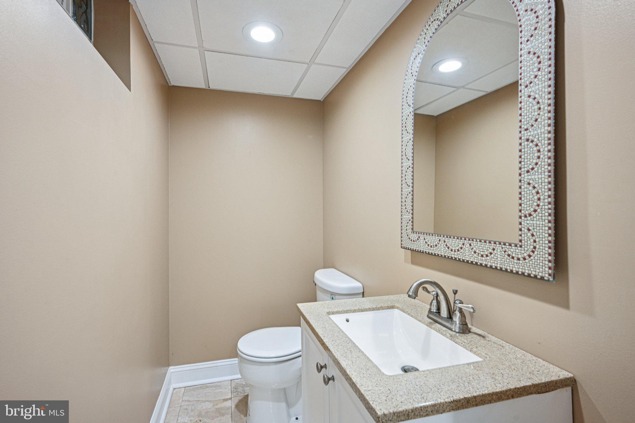 2 Keston Place Voorhees, NJ 08043 - Photo 50 of 83 a bathroom with a sink toilet and mirror