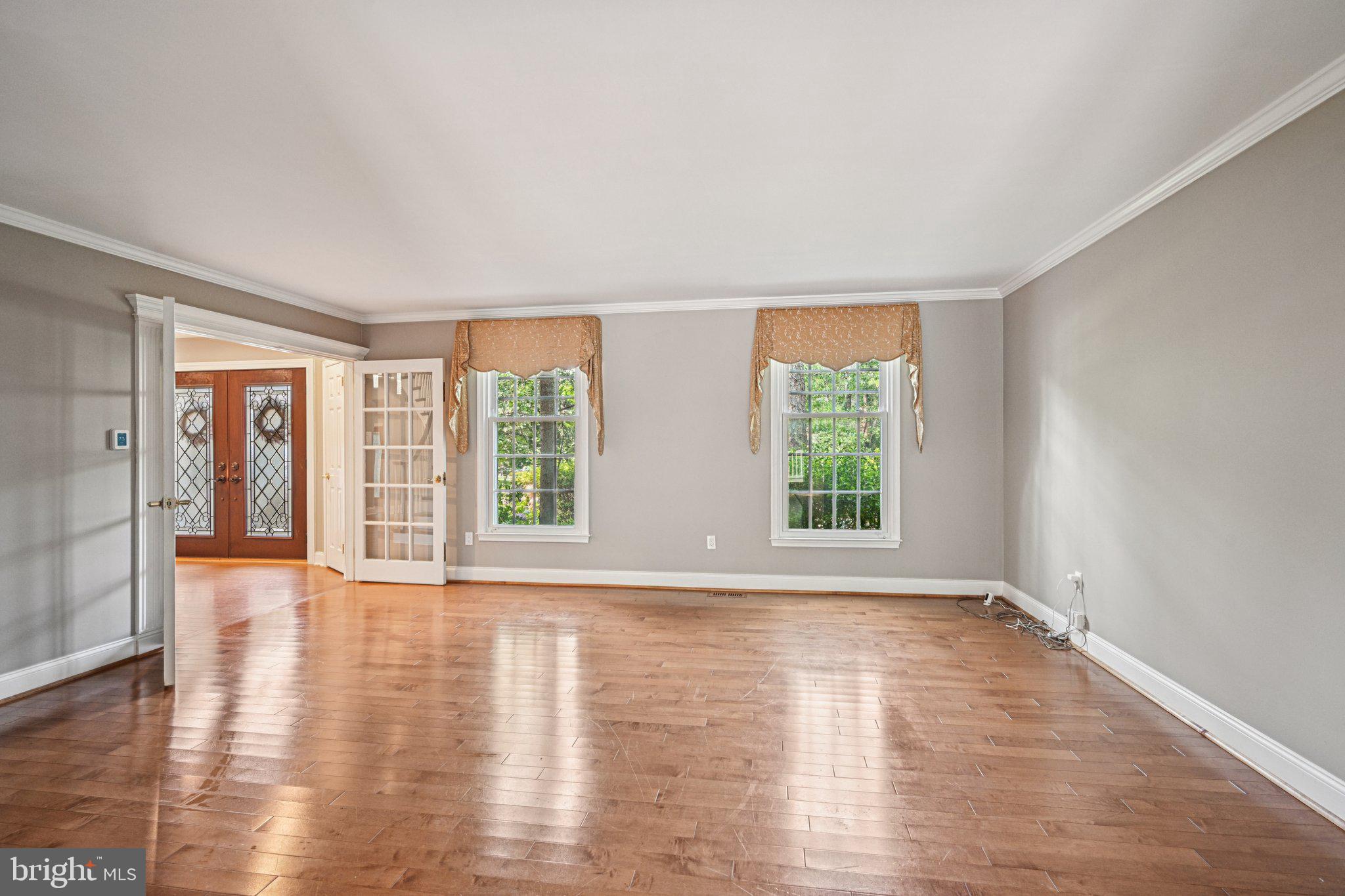 2 Keston Place Voorhees, NJ 08043 - Photo 5 of 83 a view of an empty room with wooden floor and a window