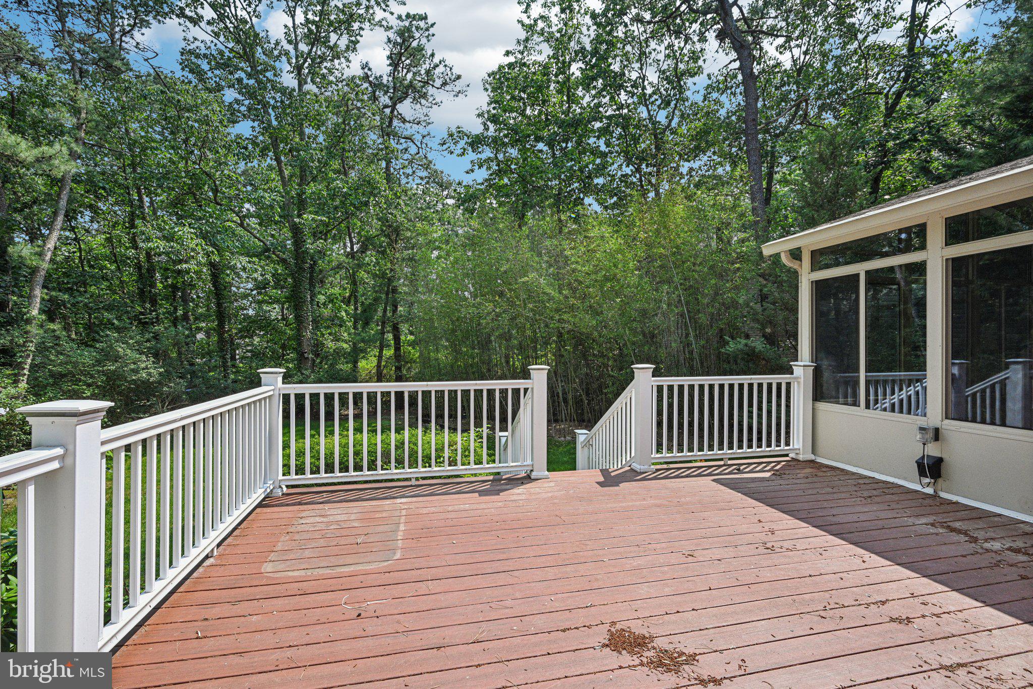 2 Keston Place Voorhees, NJ 08043 - Photo 56 of 83 a balcony with wooden floor and fence