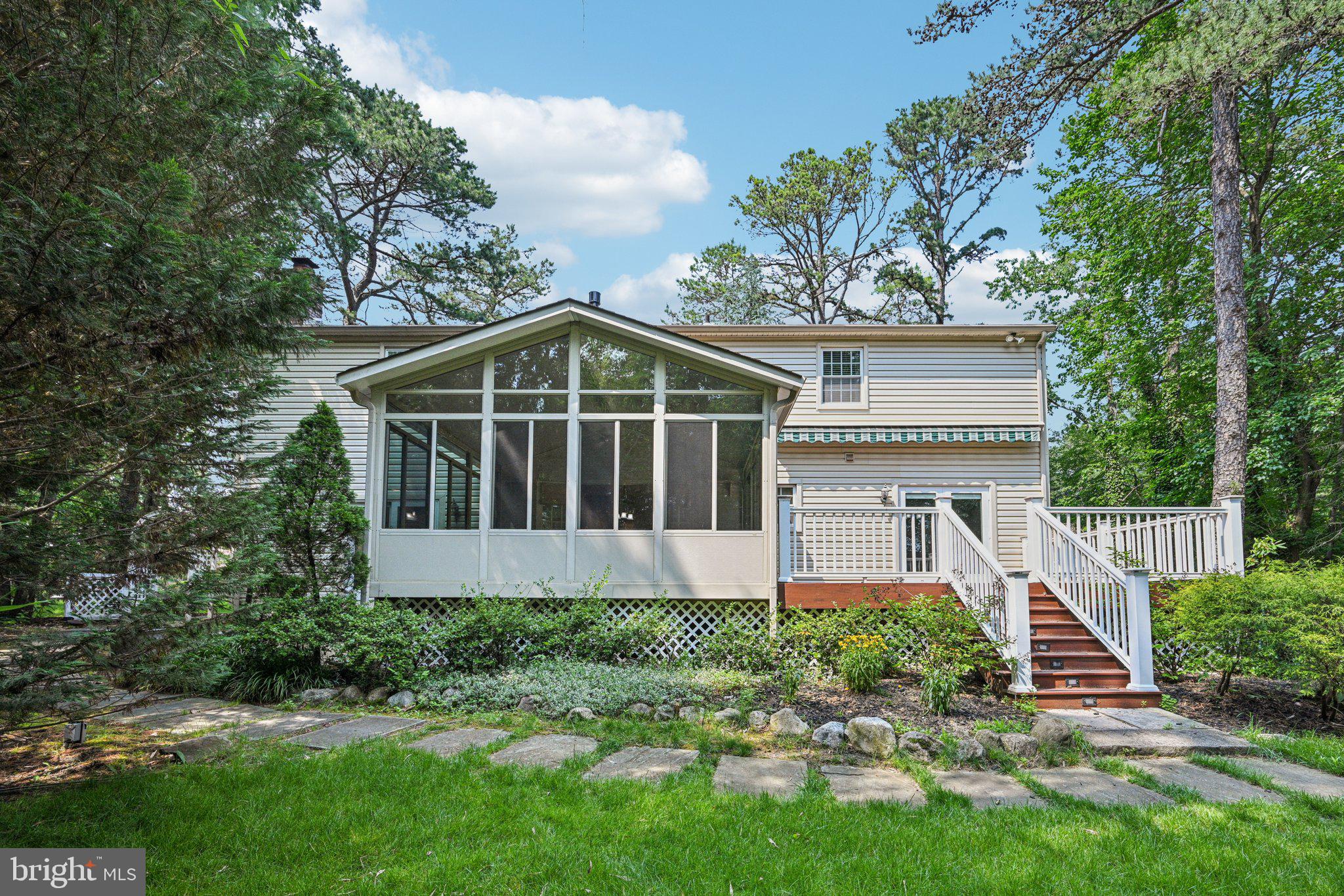 2 Keston Place Voorhees, NJ 08043 - Photo 58 of 83 a front view of a house with a yard and trees