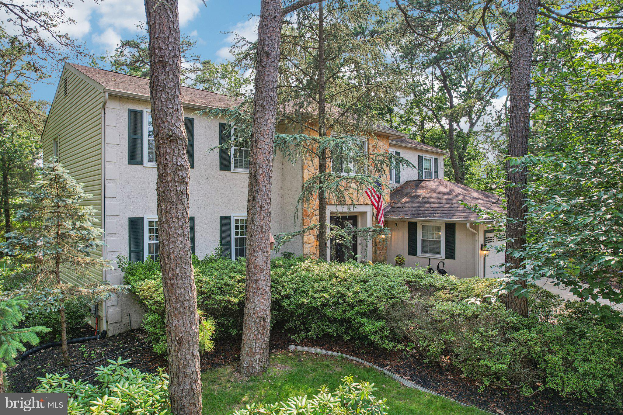2 Keston Place Voorhees, NJ 08043 - Photo 60 of 83 a front view of a house with a yard and trees
