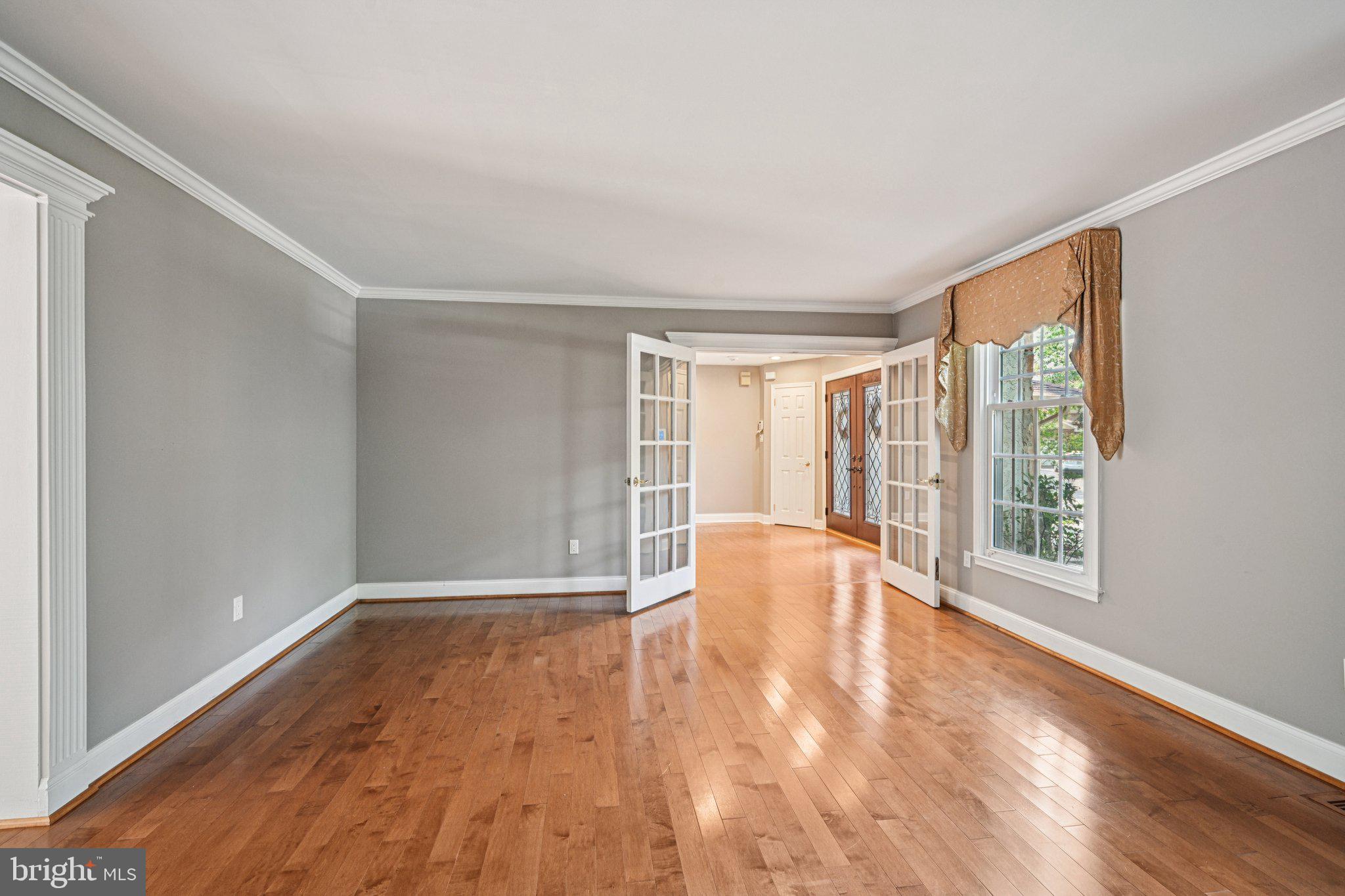 2 Keston Place Voorhees, NJ 08043 - Photo 6 of 83 a view of an empty room with wooden floor and a window
