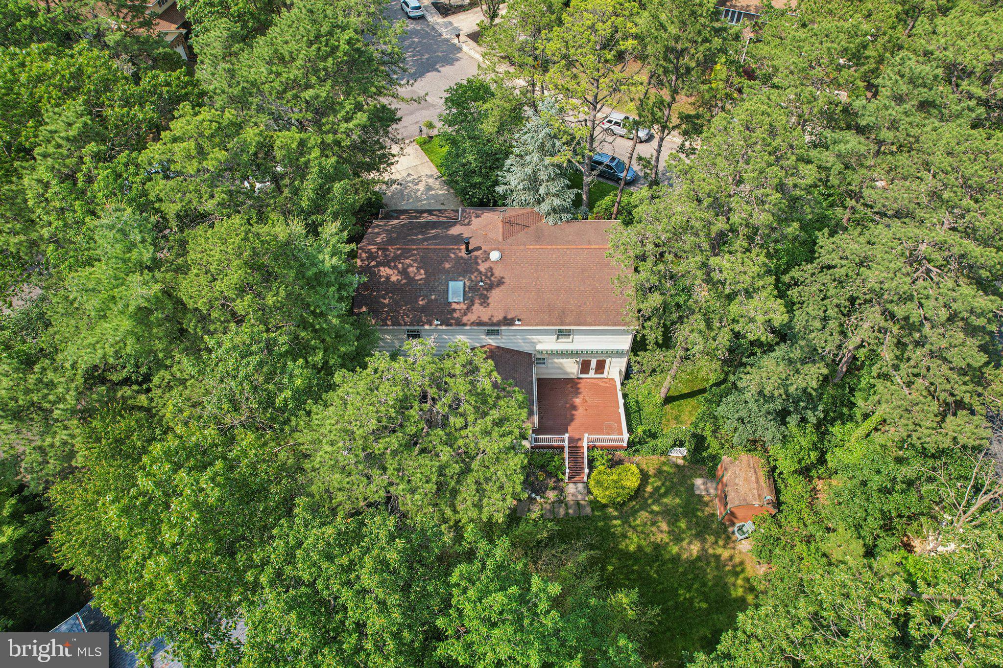 2 Keston Place Voorhees, NJ 08043 - Photo 71 of 83 a view of a house with a yard and sitting area