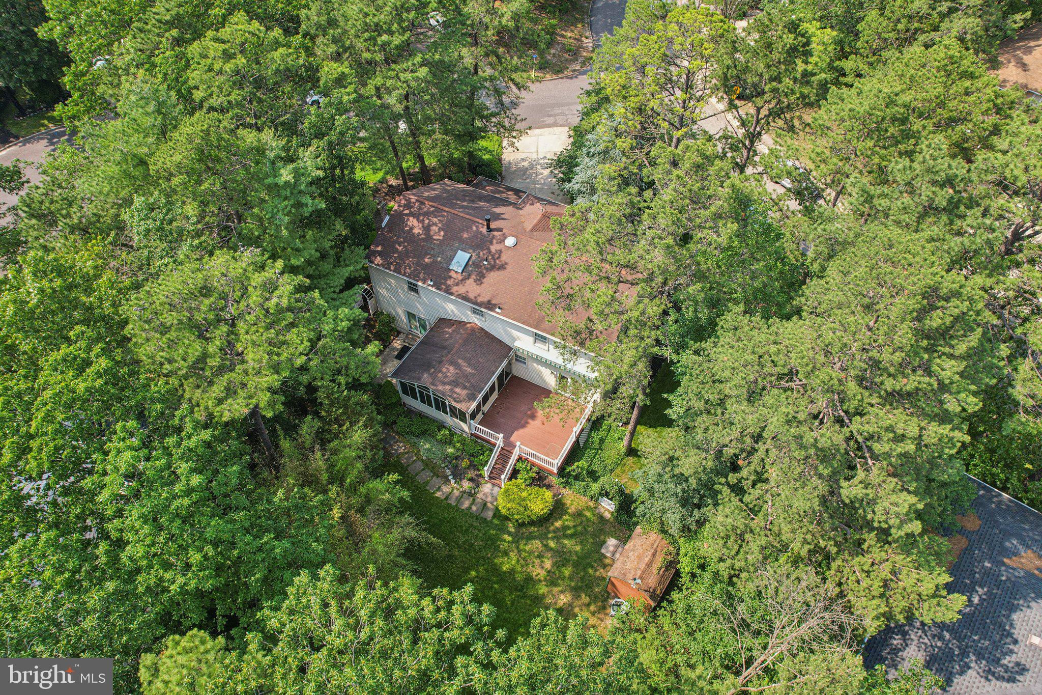 2 Keston Place Voorhees, NJ 08043 - Photo 72 of 83 an aerial view of a house with a yard and trees